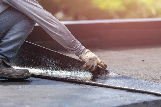 Professional Basement Waterproofing technician working in Cockeysville, MD
